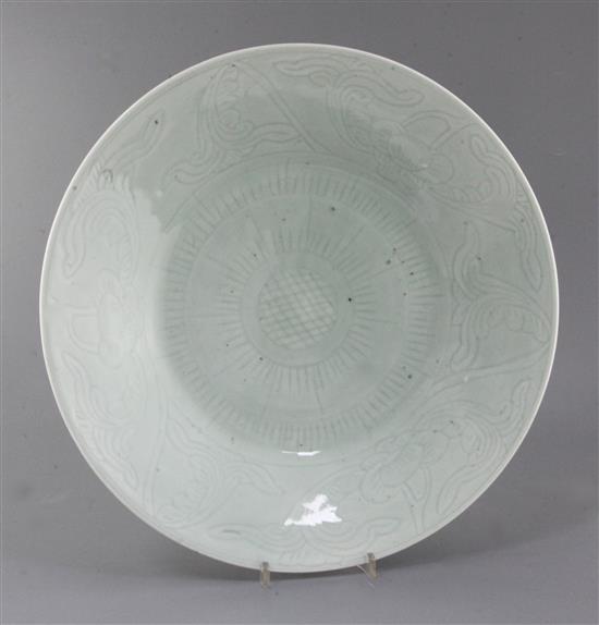 A Chinese celadon glazed dish, 19th century, 40.35cm